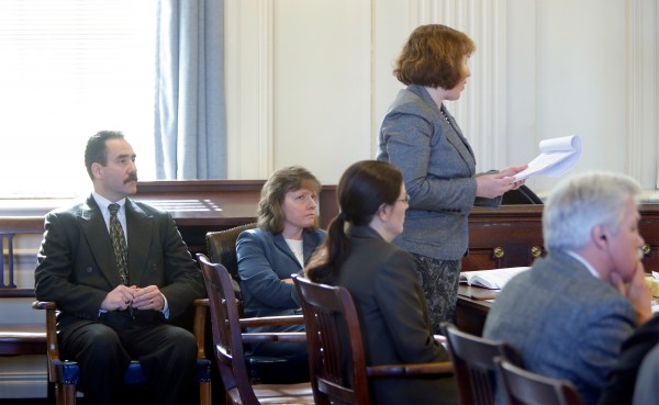 Natalie Burns (standing), an attorney representing the town of Kennebunk, addresses Justice Nancy Mills during a hearing in York County Superior Court in Alfred on Friday, Feb. 22, 2013. Seated (from left) is Kennebunk Police Chief Robert McKenzie, York County District Attorney Kathryn Slattery, Deputy District Attorney Justina McGettigan and defendant Mark Strong Sr. Natalie Burns (standing), an attorney representing the town of Kennebunk, addresses Justice Nancy Mills during a hearing in York County Superior Court in Alfred on Friday, Feb. 22, 2013. Seated (from left) is Kennebunk Police Chief Robert McKenzie, York County District Attorney Kathryn Slattery, Deputy District Attorney Justina McGettigan and defendant Mark Strong Sr.