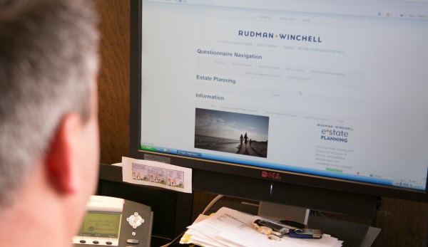 Jeff Solari, manager of business development at Rudman Winchell, scrolls through the law firm's new online legal resources on Wednesday, Feb. 6, 2013. Jeff Solari, manager of business development at Rudman Winchell, scrolls through the law firm's new online legal resources on Wednesday, Feb. 6, 2013.