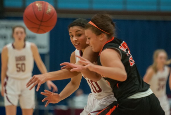 Bangor's Denae Johnson (left) and Showhegan's Taylor Johnson battle for a loose ball at the Augusta Civic Center on Friday, Feb. 15, 2013. Bangor's Denae Johnson (left) and Showhegan's Taylor Johnson battle for a loose ball at the Augusta Civic Center on Friday, Feb. 15, 2013.