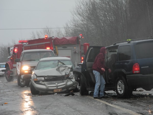 Rescue crews work Monday afternoon at the scene of a multiple vehicle crash on U.S. Route 1 in Northport where three people were injured. Rescue crews work Monday afternoon at the scene of a multiple vehicle crash on U.S. Route 1 in Northport where three people were injured.