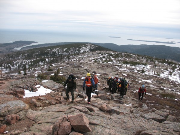 Acadia National Park rangers and members of Mount Desert Island Search and Rescue carry out a man who fell on the South Trail on Cadillac Mountain and possibly broke his hip on Wednesday, Feb. 27, 2013. The man, whose name is not being released, was hiking alone and had to wait for five hours before another hiker came along and called for help. Acadia National Park rangers and members of Mount Desert Island Search and Rescue carry out a man who fell on the South Trail on Cadillac Mountain and possibly broke his hip on Wednesday, Feb. 27, 2013. The man, whose name is not being released, was hiking alone and had to wait for five hours before another hiker came along and called for help.
