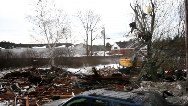 The charred remains of a house on Bluff Road in Bath Tuesday, Feb. 12, 2013. The charred remains of a house on Bluff Road in Bath Tuesday, Feb. 12, 2013.