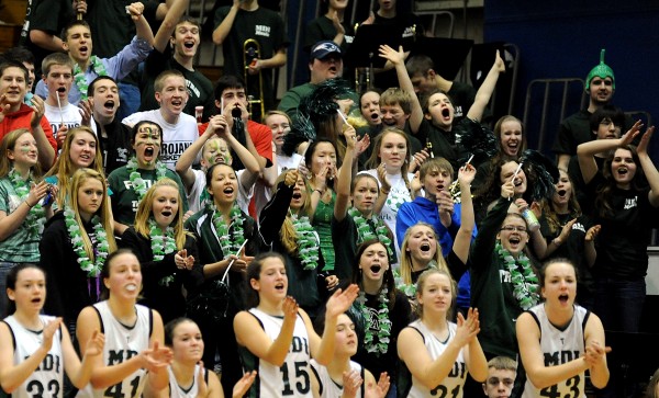 Mount Desert Island fans cheer for their girls team during the Trojans’ quarterfinal win over Winslow on Saturday at the Bangor Auditorium. The MDI and Presque Isle girls and boys teams will play in Wednesday semifinals at Auditorium with the girls game at 3:35 p.m. and the boys game at 7:05 p.m. Mount Desert Island fans cheer for their girls team during the Trojans’ quarterfinal win over Winslow on Saturday at the Bangor Auditorium. The MDI and Presque Isle girls and boys teams will play in Wednesday semifinals at Auditorium with the girls game at 3:35 p.m. and the boys game at 7:05 p.m.