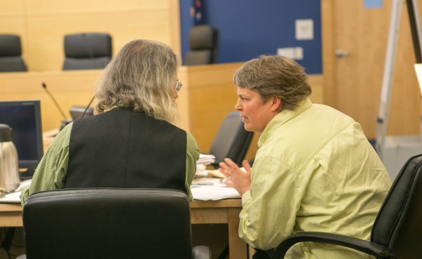 Peter Beckford, left, and his wife talk during their appellate hearing against Pisgah Mountain LLC at the Penobscot Judicial Center in Bangor on Tuesday, Feb. 12, 2013 Peter Beckford, left, and his wife talk during their appellate hearing against Pisgah Mountain LLC at the Penobscot Judicial Center in Bangor on Tuesday, Feb. 12, 2013