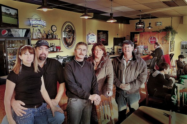 The Back Alley Pub has opened up the ownership of Tina Saccuto (left) and Dwayne Mcleod in the Family Fun Bowling Center, owned by Andy Meucci (center). Lori Levasseur (second from right) and John Johnson (right) are employees of the Back Alley Pub. The Back Alley Pub has opened up the ownership of Tina Saccuto (left) and Dwayne Mcleod in the Family Fun Bowling Center, owned by Andy Meucci (center). Lori Levasseur (second from right) and John Johnson (right) are employees of the Back Alley Pub.