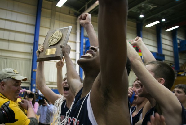 The Penquis Valley boys basketball team celebrates after winning the Eastern Maine Class C title at the Bangor Auditorium on Saturday, February 23, 2013. The Penquis Valley boys basketball team celebrates after winning the Eastern Maine Class C title at the Bangor Auditorium on Saturday, February 23, 2013.
