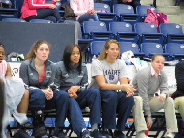 Danielle Walczak (left), Corinne Wellington and Ali Nalivaika of the University of Maine watch Saturday's game against Albany at Alfond Arena. Walczak and Wellington recently suffered injuries that will require surgery and sideline them for the rest of the season. Nalivaika was hurt during preseason and has not played. Danielle Walczak (left), Corinne Wellington and Ali Nalivaika of the University of Maine watch Saturday's game against Albany at Alfond Arena. Walczak and Wellington recently suffered injuries that will require surgery and sideline them for the rest of the season. Nalivaika was hurt during preseason and has not played.
