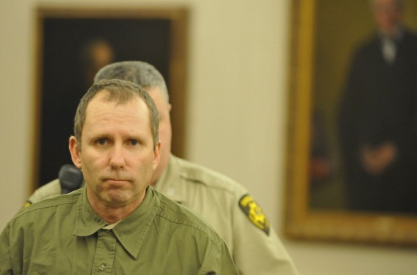 Peter Robinson enters the courtroom for his bail hearing with escort by Penobscot County Sheriffs Dept. corrections officer Peter Garland (obscured) at Penobscot Judicial Center Friday, Dec. 2, 2011. Robinson is charged in the deal of David Trask. Peter Robinson enters the courtroom for his bail hearing with escort by Penobscot County Sheriffs Dept. corrections officer Peter Garland (obscured) at Penobscot Judicial Center Friday, Dec. 2, 2011. Robinson is charged in the deal of David Trask.