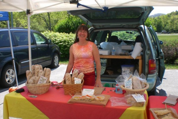 Billie Barker, in slightly warmer weather, selling her baked goods and savory treats at a farmer's market. Billie Barker, in slightly warmer weather, selling her baked goods and savory treats at a farmer's market.