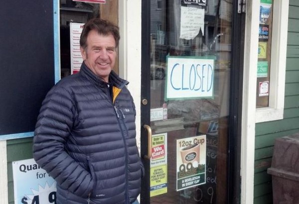 Dickie Colucci, co-owner of Colucci's Hilltop Market on Munjoy Hill in Portland, stands outside the store Monday afternoon after it was damaged over the weekend by a fire. Dickie Colucci, co-owner of Colucci's Hilltop Market on Munjoy Hill in Portland, stands outside the store Monday afternoon after it was damaged over the weekend by a fire.