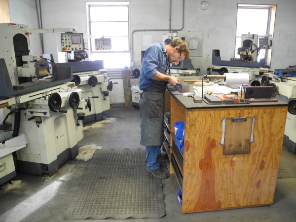 A craftsman works at the Lie-Nielsen Toolworks machine shop in Warren to fabricate one of the company's high-end hand tools. A craftsman works at the Lie-Nielsen Toolworks machine shop in Warren to fabricate one of the company's high-end hand tools.