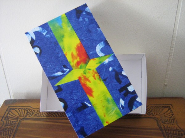 This small box was made from an old greeting card. This small box was made from an old greeting card.