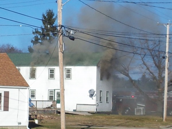 Black smokes pours from the second floor of a home at the corner of High Street and Denney Road. No one was injured in the fire, which "gutted" the home, Bath Fire Chief Stephen Hinds said at the scene. Black smokes pours from the second floor of a home at the corner of High Street and Denney Road. No one was injured in the fire, which "gutted" the home, Bath Fire Chief Stephen Hinds said at the scene.