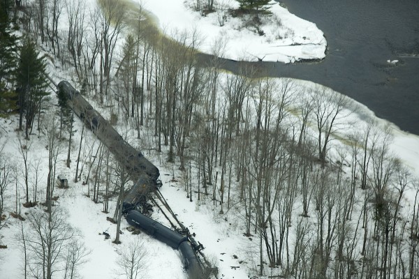An oil train pulling 15 full 33,000-gallon crude oil tankers apparently spilled only 3 gallons of oil when it derailed Thursday near Winn. An oil train pulling 15 full 33,000-gallon crude oil tankers apparently spilled only 3 gallons of oil when it derailed Thursday near Winn.