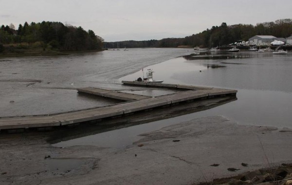 A dock on the Royal River sits in the mud during a low tide last year. Yarmouth is in line for money to dredge its harbor, although it's unclear if the funding will come through. A dock on the Royal River sits in the mud during a low tide last year. Yarmouth is in line for money to dredge its harbor, although it's unclear if the funding will come through.