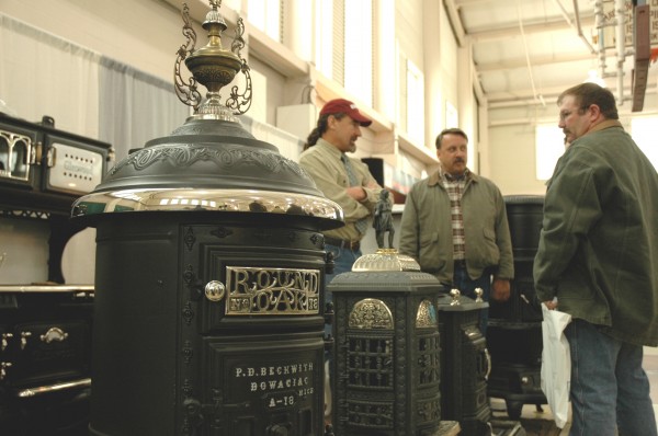 David Erickson (left), owner of Littleton, Mass.-based Erickson's Antique Stoves, discusses antique stoves with attendees of the Old House Trade Show in Portland in 2007. Erickson will be an exhibitor at the 2013 Old House Trade Show, Saturday and Sunday, March 23-24, in Portland. David Erickson (left), owner of Littleton, Mass.-based Erickson's Antique Stoves, discusses antique stoves with attendees of the Old House Trade Show in Portland in 2007. Erickson will be an exhibitor at the 2013 Old House Trade Show, Saturday and Sunday, March 23-24, in Portland.