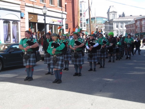 The Maine Public Safety Pipe & Drum Corps stands outside Bull Feeney's on Fore Street in Portland on Sunday. The Maine Public Safety Pipe & Drum Corps stands outside Bull Feeney's on Fore Street in Portland on Sunday.