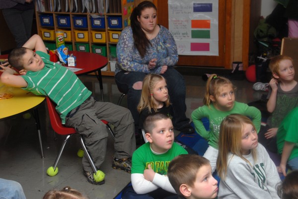 Schenck High School of East Millinocket junior Kylie Bouchard of Medway awaits the end of first-grade teacher Kelley Michauds lecture on Monday, March 4, 2013. Residents have applauded the high school's students for their embracing of Myrick's K-4 students since Myrick moved into a high school wing. Schenck High School of East Millinocket junior Kylie Bouchard of Medway awaits the end of first-grade teacher Kelley Michauds lecture on Monday, March 4, 2013. Residents have applauded the high school's students for their embracing of Myrick's K-4 students since Myrick moved into a high school wing.