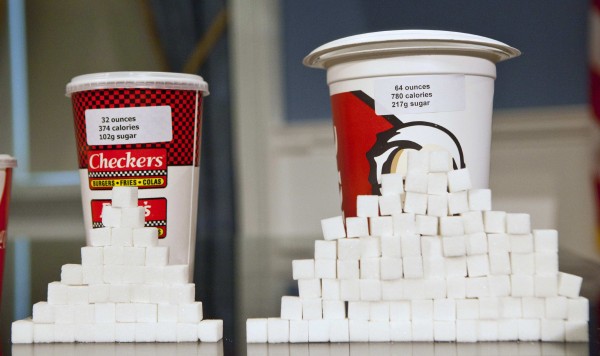 Soft drink cups sized at 32 ounces (left) and 64 ounces are displayed at a news conference at City Hall in New York on May 31, 2012. A judge on invalidated New York City’s plan to ban large sugary drinks from restaurants and other eateries on Monday, March 11, 2013. Soft drink cups sized at 32 ounces (left) and 64 ounces are displayed at a news conference at City Hall in New York on May 31, 2012. A judge on invalidated New York City’s plan to ban large sugary drinks from restaurants and other eateries on Monday, March 11, 2013.