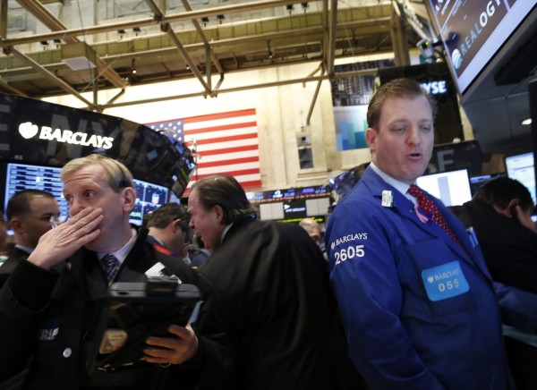 Traders work on the floor of the New York Stock Exchange March 5, 2013. The Dow surged to a new record on Tuesday, breaking through levels last seen in 2007 as investors extended 2013's rally. Traders work on the floor of the New York Stock Exchange March 5, 2013. The Dow surged to a new record on Tuesday, breaking through levels last seen in 2007 as investors extended 2013's rally.