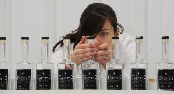 Jessica Jewell labels bottles of Twenty 2 Vodka at the distillery she owns with her husband, Scott Galbiati, in Houlton in 2010. The idea to manufacture vodka started as a college project and quickly turned into a family business. Jessica Jewell labels bottles of Twenty 2 Vodka at the distillery she owns with her husband, Scott Galbiati, in Houlton in 2010. The idea to manufacture vodka started as a college project and quickly turned into a family business.
