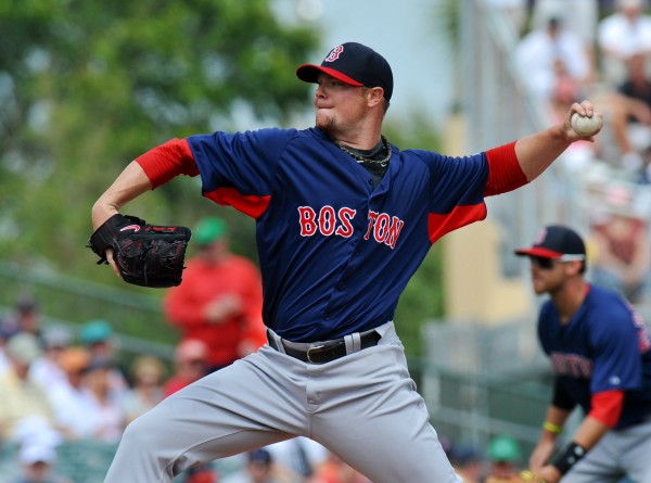 Boston Red Sox starting pitcher Jon Lester throws during a spring training game against the Miami Marlins on March 11 in Jupiter, Fla. The Red Sox are hoping for a bounce-back season from Lester after he struggled last season with a 9-14 record and 4.82 ERA. Boston Red Sox starting pitcher Jon Lester throws during a spring training game against the Miami Marlins on March 11 in Jupiter, Fla. The Red Sox are hoping for a bounce-back season from Lester after he struggled last season with a 9-14 record and 4.82 ERA.