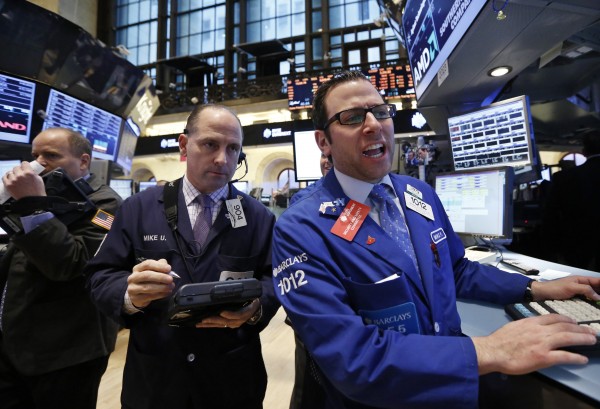 Traders work on the floor at the New York Stock Exchange on March 28, the day the S&P 500 closed at a record high. Traders work on the floor at the New York Stock Exchange on March 28, the day the S&P 500 closed at a record high.