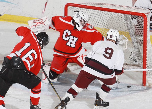 Reid Howland (9) of Greely eludes Jack Orne (16) of Camden Hills and scores one of his three goals against Windjammers goalie Jet Magri during the first period of Tuesday's Western Maine Class B title game at the Androscoggin Bank Colisee in Lewiston. The Rangers won 7-1. Reid Howland (9) of Greely eludes Jack Orne (16) of Camden Hills and scores one of his three goals against Windjammers goalie Jet Magri during the first period of Tuesday's Western Maine Class B title game at the Androscoggin Bank Colisee in Lewiston. The Rangers won 7-1.