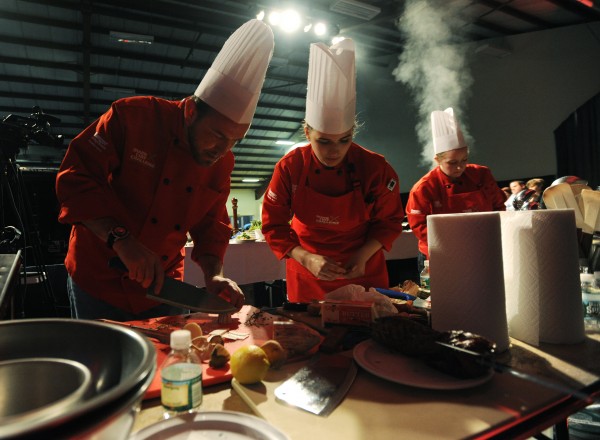 Chef Meghan Woodbury, center, and her team , Brett Settle, left and Hillary Herrick prepare the first course during the Maine Chef Challenge at Eastern Maine Community College on Friday, March 25, 2012. Chef Meghan Woodbury, center, and her team , Brett Settle, left and Hillary Herrick prepare the first course during the Maine Chef Challenge at Eastern Maine Community College on Friday, March 25, 2012.