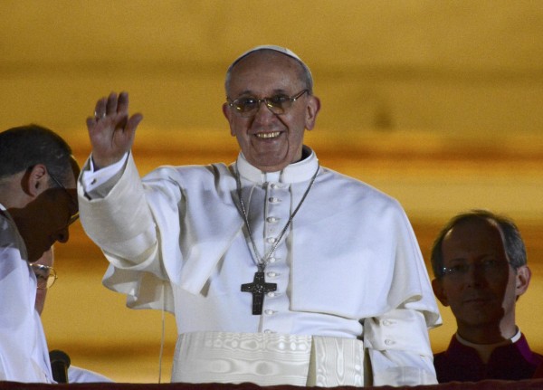 Newly elected Pope Francis, Cardinal Jorge Mario Bergoglio of Argentina, appears on the balcony of St. Peter's Basilica after being elected by the conclave of cardinals, at the Vatican, March 13, 2013. Newly elected Pope Francis, Cardinal Jorge Mario Bergoglio of Argentina, appears on the balcony of St. Peter's Basilica after being elected by the conclave of cardinals, at the Vatican, March 13, 2013.