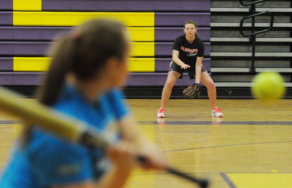 Bucksport high school student Kim Nason looks to field a ball off the bat of Debbie Wight during the first softball try out of the season at Bucksport High School on Monday. Bucksport high school student Kim Nason looks to field a ball off the bat of Debbie Wight during the first softball try out of the season at Bucksport High School on Monday.