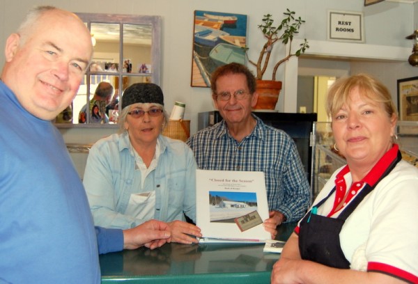 A whimsical "Closed for the Season" cookbook compiled over the winter by a group of regulars at the Chester Pike's Galley in Sullivan was presented on "opening day" Saturday to the two women who are beginning the tenth year of serving up Down East fare deemed in 2009 by Yankee Magazine among "New England's Best" restaurants. From left are Roger Dean of Corea, Pike's pastry chef Amy McGarr, Mike Shapiro of West Gouldsboro and Jane Fogg, the restaurant's cook. A whimsical "Closed for the Season" cookbook compiled over the winter by a group of regulars at the Chester Pike's Galley in Sullivan was presented on "opening day" Saturday to the two women who are beginning the tenth year of serving up Down East fare deemed in 2009 by Yankee Magazine among "New England's Best" restaurants. From left are Roger Dean of Corea, Pike's pastry chef Amy McGarr, Mike Shapiro of West Gouldsboro and Jane Fogg, the restaurant's cook.