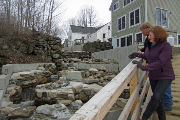 Deb Wilson and Mark Becker look out over a portion of the restored Damariscotta Mills fish ladder. Although the restoration is not yet complete, Wilson said Sunday that the alewives -- due any day -- will "go like wildfire" up the new ladder. Deb Wilson and Mark Becker look out over a portion of the restored Damariscotta Mills fish ladder. Although the restoration is not yet complete, Wilson said Sunday that the alewives -- due any day -- will "go like wildfire" up the new ladder.