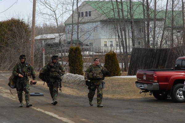 Members of a Maine State Police tactical unit walk back to their vehicles following the peaceful conclusion of a 10-hour standoff at a home on Flewelling Drive in Crouseville. Neighbors reported seeing a woman surrendering to police just after 10 a.m. Tuesday. Members of a Maine State Police tactical unit walk back to their vehicles following the peaceful conclusion of a 10-hour standoff at a home on Flewelling Drive in Crouseville. Neighbors reported seeing a woman surrendering to police just after 10 a.m. Tuesday.