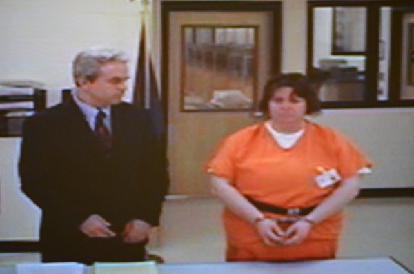 Michelle Corson of Skowhegan (right) appears with her attorney for the day Peter Barnett during her initial court appearance on Friday, April 19, 2013. She appeared before Judge Charles Dow in Skowhegan District Court through a video connection to Somerset County Jail in Madison. Michelle Corson of Skowhegan (right) appears with her attorney for the day Peter Barnett during her initial court appearance on Friday, April 19, 2013. She appeared before Judge Charles Dow in Skowhegan District Court through a video connection to Somerset County Jail in Madison.