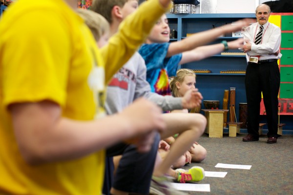 Tony Cipollone, president and CEO of the John T. Gorman Foundation, watches fourth-graders at Lyseth Elementary School in Portland rehearse a musical number Monday morning. Cipollone was visiting as part of the Poprtland Public Schools and Portland Regional Chamber of Commerce's Principal for a Day program. Tony Cipollone, president and CEO of the John T. Gorman Foundation, watches fourth-graders at Lyseth Elementary School in Portland rehearse a musical number Monday morning. Cipollone was visiting as part of the Poprtland Public Schools and Portland Regional Chamber of Commerce's Principal for a Day program.