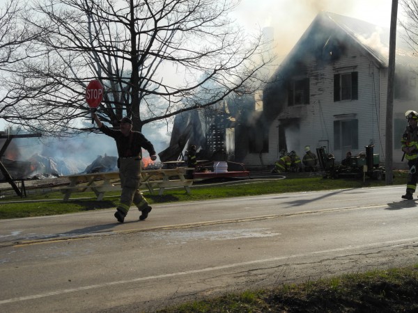 A firefighter works at the scene of a fire on Route 137 on Monday afternoon that destroyed the home of Jackie and Bill Bryant. The house, built in the 1800s, used to be a stagecoach stop on the Waterville-Belfast route, Jackie Bryant said. A firefighter works at the scene of a fire on Route 137 on Monday afternoon that destroyed the home of Jackie and Bill Bryant. The house, built in the 1800s, used to be a stagecoach stop on the Waterville-Belfast route, Jackie Bryant said.