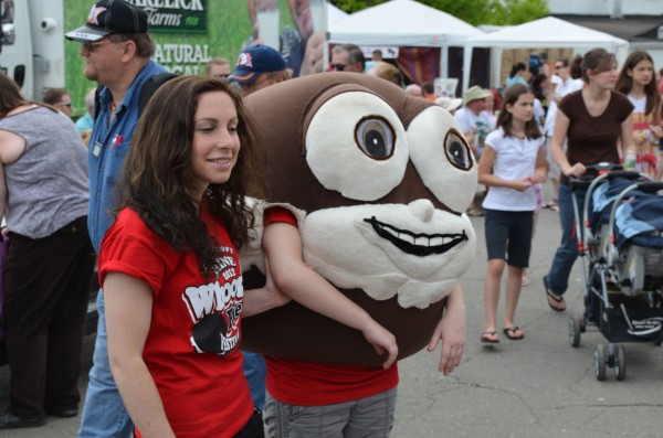 A volunteer helps Sweetie Pie, the mascot for the fourth annual Maine Whoopie Pie Festival, around to meet children in Dover-Foxcroft on Saturday, June 23, 2012. A volunteer helps Sweetie Pie, the mascot for the fourth annual Maine Whoopie Pie Festival, around to meet children in Dover-Foxcroft on Saturday, June 23, 2012.