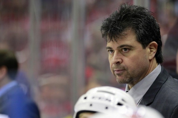 New York Islanders head coach Jack Capuano watches from the bench against the Washington Capitals during a game on March 26 in Washington. Capuano, a former University of Maine hockey standout, has led the Islanders to a playoff berth. New York Islanders head coach Jack Capuano watches from the bench against the Washington Capitals during a game on March 26 in Washington. Capuano, a former University of Maine hockey standout, has led the Islanders to a playoff berth.