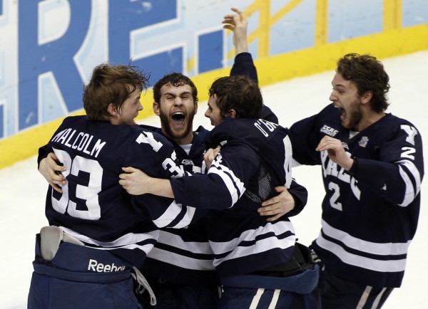 Yale's Jeff Malcolm (L-R), Charles Orzetti, Rob O'Gara and Gus Young celebrate their win over Quinnipiac to earn the men's NCAA college ice hockey national championship game in Pittsburgh, Pennsylvania, April 13, 2013. Yale's Jeff Malcolm (L-R), Charles Orzetti, Rob O'Gara and Gus Young celebrate their win over Quinnipiac to earn the men's NCAA college ice hockey national championship game in Pittsburgh, Pennsylvania, April 13, 2013.