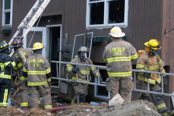 Howland, Lincoln and Mattawamkeag firefighters responded to a fire that heavily damaged a home at 345 Transalpine Road in Lincoln on Monday, April 1, 2013. Howland, Lincoln and Mattawamkeag firefighters responded to a fire that heavily damaged a home at 345 Transalpine Road in Lincoln on Monday, April 1, 2013.
