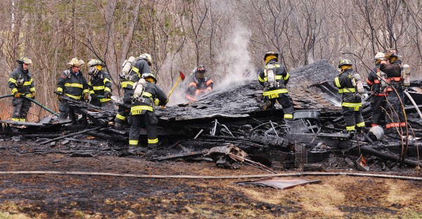 Firefighters from several towns fought a barn fire along River Road in Orrington on Thursday. Firefighters from several towns fought a barn fire along River Road in Orrington on Thursday.