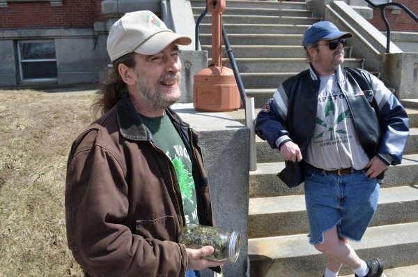 Donald Christen (left) holds a jar full of medical marijuana as he protests marijuana laws for the 23rd straight year outside Somerset County Superior Court in Skowhegan on Monday. Charles Hutchins of Canaan (right) also protested outside the courthouse. Donald Christen (left) holds a jar full of medical marijuana as he protests marijuana laws for the 23rd straight year outside Somerset County Superior Court in Skowhegan on Monday. Charles Hutchins of Canaan (right) also protested outside the courthouse.