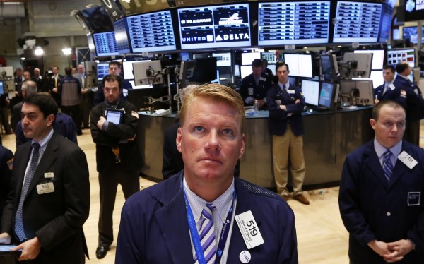 Traders observe a moment of silence to honor the victims and families of the Boston Marathon bombings, before the opening bell on the floor of the New York Stock Exchange, April 16, 2013. Traders observe a moment of silence to honor the victims and families of the Boston Marathon bombings, before the opening bell on the floor of the New York Stock Exchange, April 16, 2013.