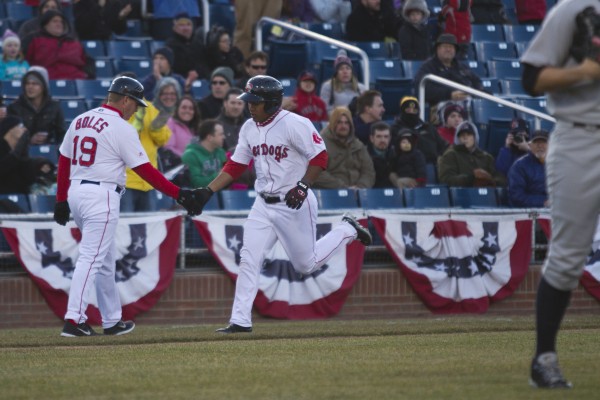 Heiker Meneses of the Portland Sea Dogs is congratulated by third base coach Kevin Boles after hitting a three-run home run in the second inning of Thursday's game against Trenton at Hadlock Field in Portland. Heiker Meneses of the Portland Sea Dogs is congratulated by third base coach Kevin Boles after hitting a three-run home run in the second inning of Thursday's game against Trenton at Hadlock Field in Portland.