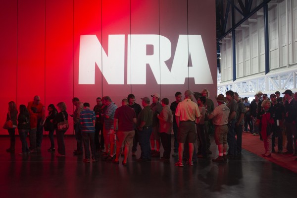Attendees line-up at a book signing event during the National Rifle Association's annual meeting in Houston, Texas on May 5, 2013. Attendees line-up at a book signing event during the National Rifle Association's annual meeting in Houston, Texas on May 5, 2013.