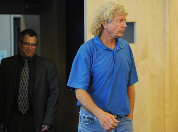 Dana Wilson enters the courtroom at the Penobscot Judicial Center with his attorney Jeffrey Silverstein on Thursday morning where he pleaded no contest to possession of child pornography. Dana Wilson enters the courtroom at the Penobscot Judicial Center with his attorney Jeffrey Silverstein on Thursday morning where he pleaded no contest to possession of child pornography.