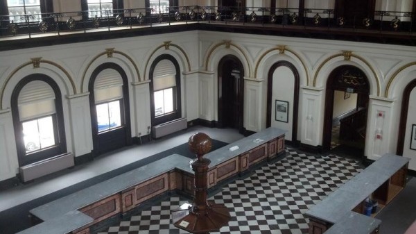 A view of Customs Hall inside the newly restored U.S. Custom House in Portland, from the second-floor balcony where armed guards once kept watch of merchants paying tariffs. A view of Customs Hall inside the newly restored U.S. Custom House in Portland, from the second-floor balcony where armed guards once kept watch of merchants paying tariffs.