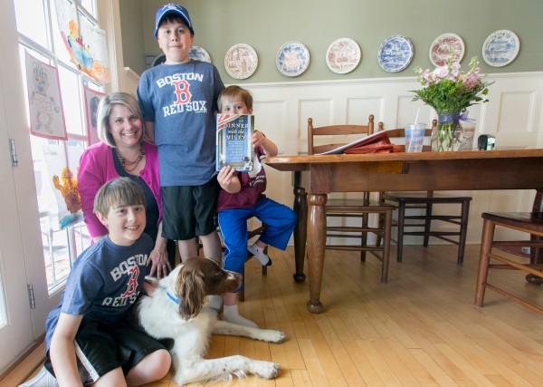 Sarah Smiley poses with her three sons, from left to right, Owen, Ford and Lindell, and her newly published book "Dinner with the Smileys." Smiley and her sons began inviting a guest join them for dinner at their Bangor home to fill in her husband's seat during his year-long military deployment. Over the year, the Smiley's guest list grew to include celebrities, professional athletes and U.S. senators. Smiley recounts the family's experience in the book. Sarah Smiley poses with her three sons, from left to right, Owen, Ford and Lindell, and her newly published book "Dinner with the Smileys." Smiley and her sons began inviting a guest join them for dinner at their Bangor home to fill in her husband's seat during his year-long military deployment. Over the year, the Smiley's guest list grew to include celebrities, professional athletes and U.S. senators. Smiley recounts the family's experience in the book.