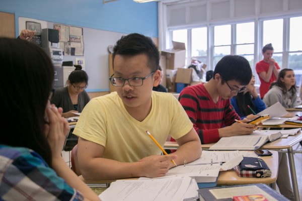 Chinese students Michael Gao (right) and Mindy Yi discuss their practice exam during their AP statistics class at Orono High School on Thursday, May 9, 2013. Chinese students Michael Gao (right) and Mindy Yi discuss their practice exam during their AP statistics class at Orono High School on Thursday, May 9, 2013.